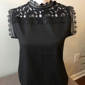 Black, sleeveless lace blouse